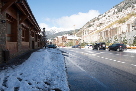 Beautiful Cityscape of Soldeu, Canillo, Andorra on an autumn morning in its first snowfall of the season.のeditorial素材