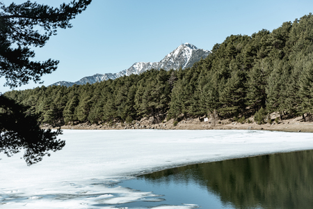 In Winter the Frozen Lake of Engolasters, Encamp, Andorra.の写真素材