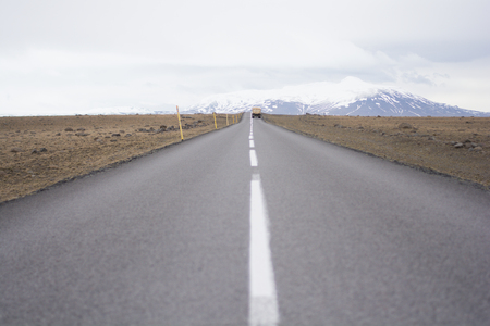 Route 1 or Ring Road (Hringvegur) national road that runs around the island and connects popular tourist attractions in Iceland, Scandinavia. Fjallsjokull glacier tongue is seen in backgroundの写真素材