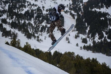 El Tarter, Andorra. 29 March 2019: Snowboarder participating in the Total Fight 2019 Grandvalira Andorra.のeditorial素材