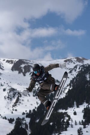 El Tarter, Andorra. 29 March 2019: Snowboarder participating in the Total Fight 2019 Grandvalira Andorra.のeditorial素材