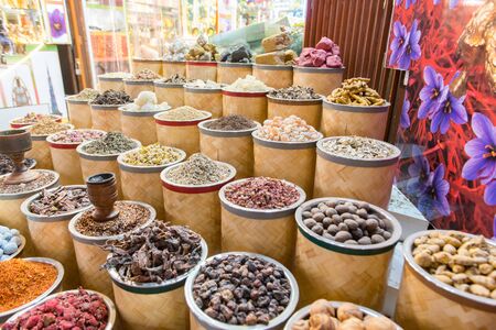 Dubai, United Arab Emirates â€“ November 15, 2019: Covered alley of a traditional bazaar with...
