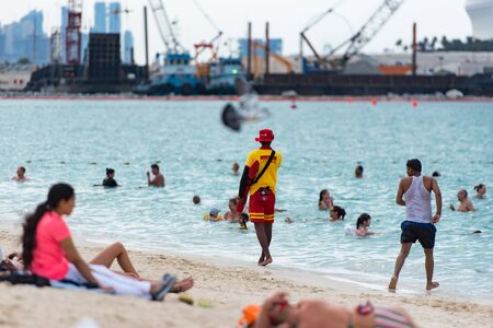 Dubai,UAE / 15 november. 2019 : people enjoying the Jumeirah Beach in Dubai witch is a white sand beach that is located and named after the Jumeirah district of Dubai.のeditorial素材
