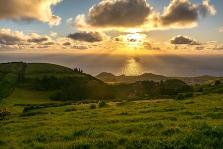 Miradouro da Vista do Rei - the famous viewpont in Sao Miguel island, Azores, Portugal towards lakes and Sete Cidades village on beautiful sunny dayの写真素材