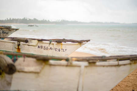 Tangalle, Sri Lanka : 2020 NOV 25 : ShipÂ´s  in the Sunset in the beach of Tangalle, Sri Lanka.のeditorial素材