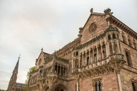 Palace of Sobrellano and church from Comillas, Santander, Spainのeditorial素材