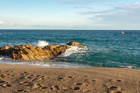 PLATJA D ARO,SPAIN : Feb 7, 2016 : Sunset in Mediterranean beach in Costa Brava, Platja d...