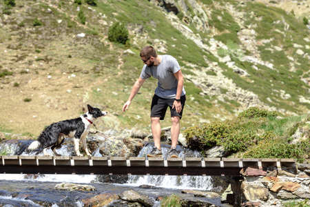 Ordino, Andorra : 2020 may 29 : Young men in the Beautiful view hiking in the Andorra Pyrenees Mountains in Ordino, near the Lakes of Tristaina.のeditorial素材