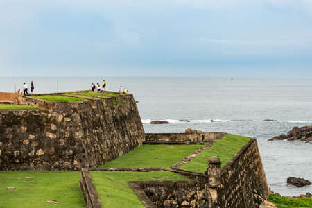 Galle, Sri Lanka. 2019 Nov 19 : People Visit the wall in Galle Fort in Bay of Galle on southwest coast of Sri Lanka.のeditorial素材