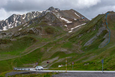 Pas de la Casa, Encamp. Andorra : 2020 17 June : Sunny day with low clouds in the town of Pas de la Casa on the border between Frace and Andorra in June 2020.のeditorial素材