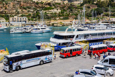 CIRKEWWA, MALTA - 2019 May 15: Ferry crosses the Gozo channel in Cirkewwa, Malta on may 15, 2019. The Gozo Channel Line operates the crossing between the two islands of Malta and Gozo.のeditorial素材
