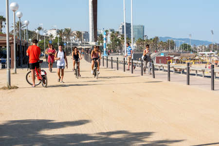 BARCELONA - JUNE 26, 2020: Platja de la Nova IcÃ ria beach with people in summer after COVID 19 on June 26, 2020 in Barcelona, ââSpain.のeditorial素材
