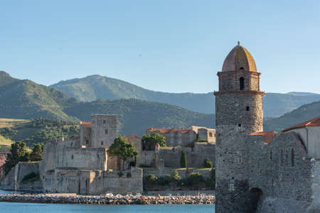 Beautiful autumn day in the tourist city of Colliure in Occitania whit on back the church of Notre...