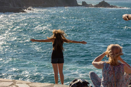 Colioure, France - July 21, 2020: Tourists near chapel of Saint Vincent in sea of Collioure in south of France.のeditorial素材