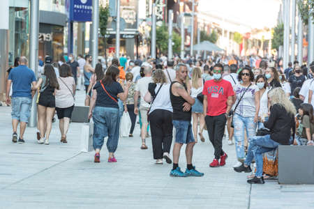 Andorra La Vella, Andorra: 2020 July 06: People Walk in the Comercial Street named Meritxell after...