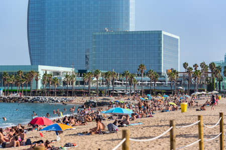 Barcelona, Spain - July 28 2020: People in the Barceloneta Beach after COVID 19 La Barceloneta in Barcelona, Spain.のeditorial素材
