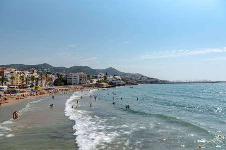 Sitges, Catalonia, Spain: July 28, 2020: People in the beach in Sitges in summer 2020.のeditorial素材
