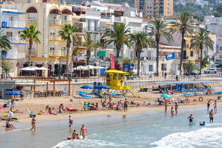 Sitges, Catalonia, Spain: July 28, 2020: People in the beach in Sitges in summer 2020.のeditorial素材