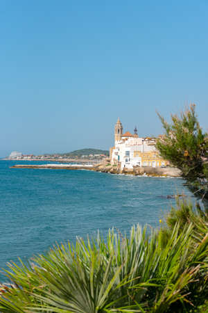 Sandy beach and historic old town in the Mediterranean complex Sitges near Barcelona, ââCosta Dorada, Catalonia, Spainのeditorial素材
