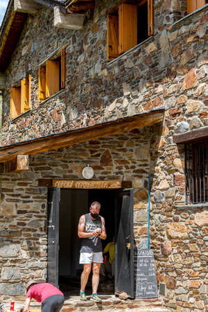 Coma Pedrosa, Andorra: 02 August 2020: Group of Tourist in Coma Pedrosa refuge at 2266 meters of altitude in Andorra Pyrenees in summer 2020.のeditorial素材