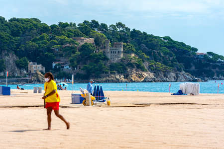 Lloret de Mar, Spain: 2020 2 Sept: People in the beach of Lloret de Mar after Covid 19 without international tourists in summer 2020のeditorial素材