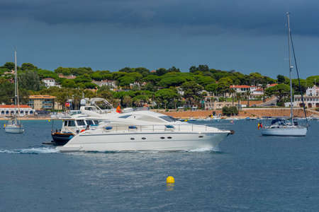 Sant Feliu de Guixols, Spain: 02 Sept 2020: Boats Village of Sant Feliu de Guixols at Costa Brava in...