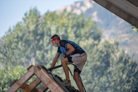 Encamp, Andorra: 2020 Sept 05: Competitors participate in the 2020 Spartan Race obstacle racing...