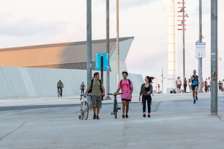 Barcelona, Spain: 2020 02 Sept: People walk in the street in the Forum in Barcelona in summer 2020.