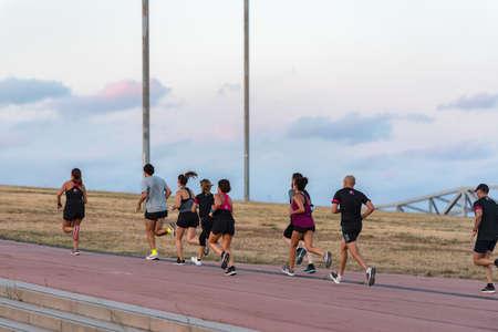 Barcelona, Spain: 2020 02 Sept: People run in Cross Fit session in the street in the Forum in Barcelona in summer 2020.のeditorial素材