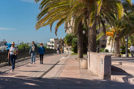 Tarragona, Spain: 2020 September 27: Sunny day in Tarragona, People in Passeig de les Palmeres in...
