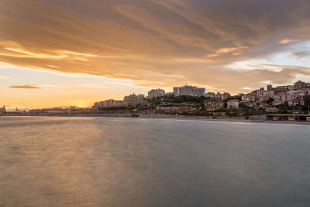 Beautiful sunny sunset in the city of Tarragona, in Catalonia, Spain in the summer of 2020.の写真素材