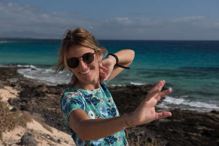 Woman in the Dunas de Corralejo Natural Park in Fuerteventura, Spain in the fall of 2020.