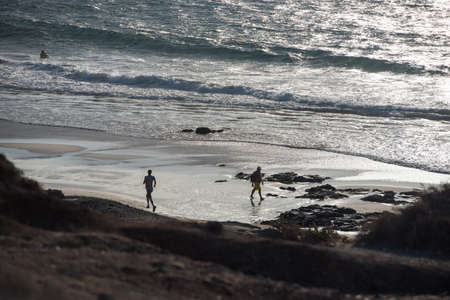 El Cotillo, Fuerteventura, Spain: 2020 October 1: People in the Coast in Fuerteventura at El Cotillo in the Canary Islands, Spain in summer 2020.のeditorial素材