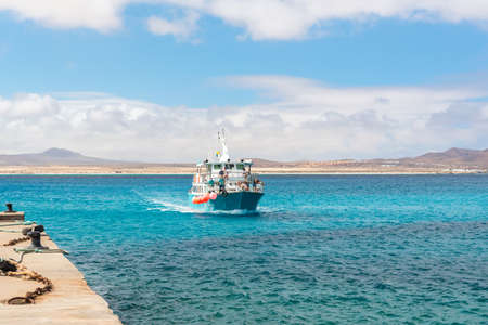 Isla Lobos, Fuerteventura, Spain: 2020 October 3: Tourists arriving by Ferry to Isla Lobos in...