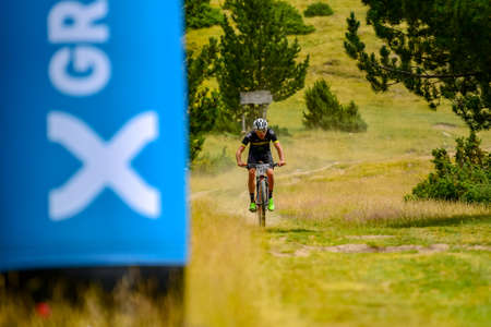 Parc Natural del Alt Urgell, Lleida, Spain: 2019 July 26: Cyclists in ANDORRA BIKE RACE 2019 in Andorra. Amateur race in Andorra.のeditorial素材