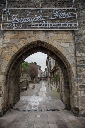 MIREPOIX, FRANCE - december 21, 2020: Old framework houses at main square of medieval village Mirepoix in southern Franceのeditorial素材