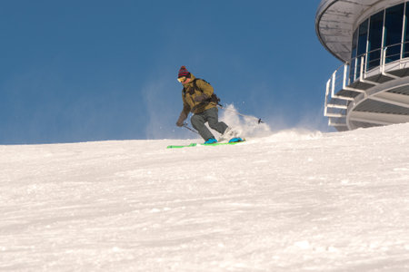 Pas de la Casa, Andorra: 2021 January 03: Young man skiing in the Pyrenees at the Grandvalira ski resort in Andorra in Covid19 timeのeditorial素材