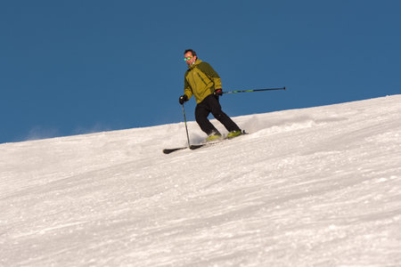 Pas de la Casa, Andorra: 2021 January 03: Young man skiing in the Pyrenees at the Grandvalira ski resort in Andorra in Covid19 timeのeditorial素材