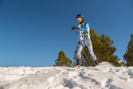 Grau Roig, Andorra: 2021 Jan 03: Man in the mountains practicing mountain skiing in the Pyrenees of Andorra in 2021.のeditorial素材