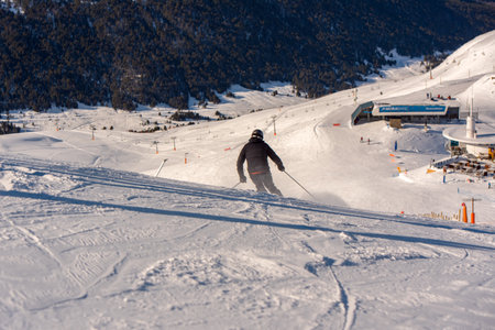 Pas de la Casa, Andorra: 2021 January 03: Young man skiing in the Pyrenees at the Grandvalira ski resort in Andorra in Covid19 timeのeditorial素材