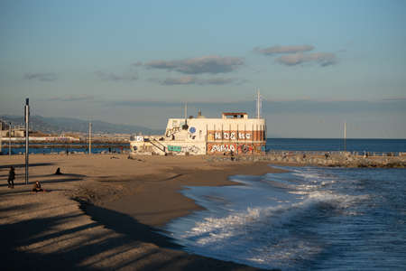Barcelona, Spain: 2021 February 12: Mar Bella Beach on the Barcelona seafront at the time of Covid 19 in the winter of 2021.のeditorial素材