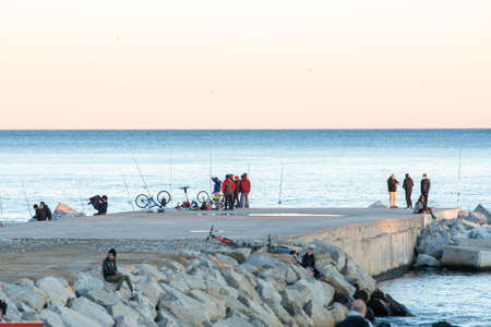 Barcelona, Spain - Febrary, 2021 - Sunset in Nova Icaria Beach in the Barcelona area on the Mediterranean on winter 2021のeditorial素材