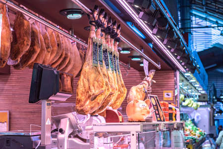 Barcelona, Spain: 2021 February 11: Iberic ham in the Sant Josep La boqueria market in Winter 2021 in times of covid 19 in Barcelonaのeditorial素材