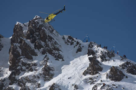 Ordino Arcalis, Andorra: 2021 February 24: Helicpoter in action at the Freeride World Tour 2021 Step 2 at Ordino Alcalis in Andorra in the winter of 2021.のeditorial素材