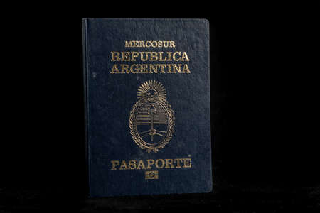 Argentinian passport in background black.のeditorial素材