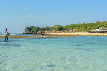 Balangan Beach, Bali, Indonesia: 2018 April 29: Fisherman in beach of Balangan Beach, Bali, Indonesiaのeditorial素材