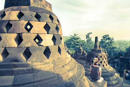 Yogyakarta, Java, Indonesia: Nov 15, 2017: Tourist on Borobudur Temple during the day, Yogyakarta, Java, Indonesia.のeditorial素材