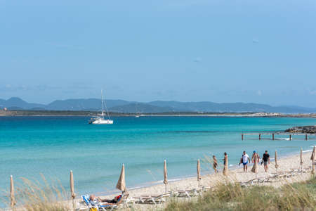 Formentera, Spain: 2021 My 26: People on the coast of Ses Illetes beach in Formentera, Balearic Islands in Spain.のeditorial素材