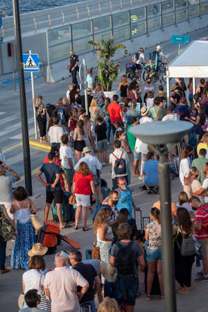 Formentera, Spain: 2021 June 14: People Waiting in Ferry at La Marina de Formentera dock in Spain in times of Covid19のeditorial素材