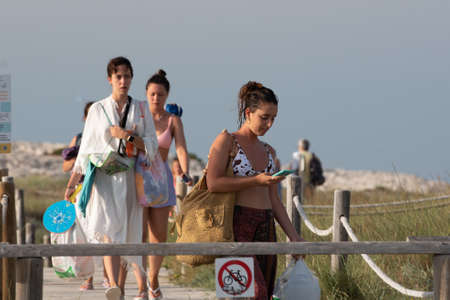 Formentera, Spain: 2021 June 13: Tourists enjoying the Illetes Beach in Formentera in Spain in times of Covid19のeditorial素材